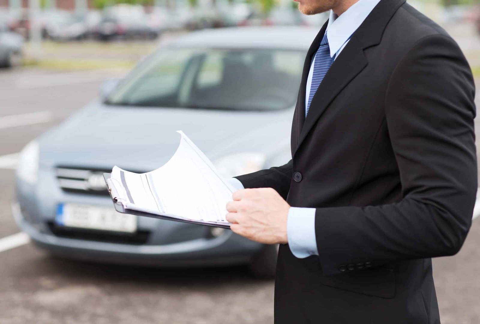 Transportation,And,Ownership,Concept, ,Man,With,Car,Documents,Outside