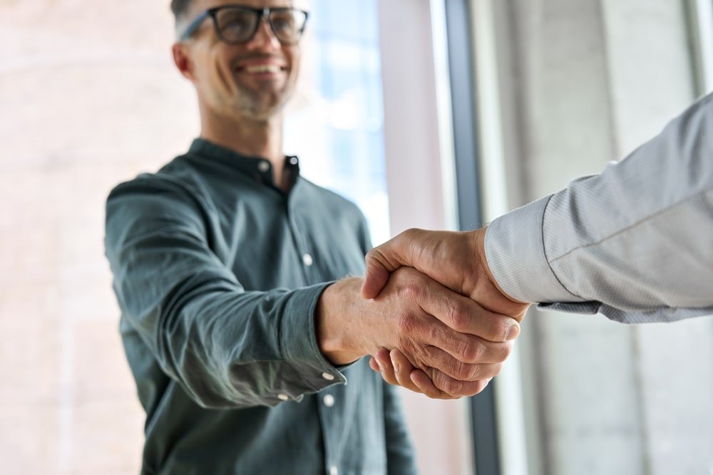 Two,Happy,Diverse,Professional,Business,Men,Executive,Leaders,Shaking,Hands