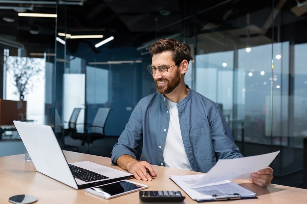 Mature,Businessman,In,Shirt,Doing,Paperwork,,Man,Working,With,Documents,