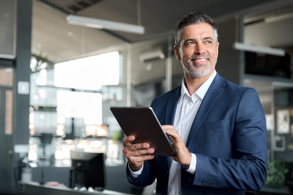 Happy,Middle,Aged,Business,Man,Ceo,Wearing,Suit,Standing,In