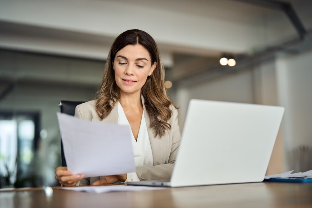 Busy,40,Years,Old,Business,Woman,Working,In,Office,Checking