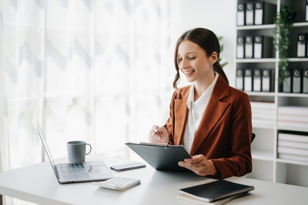 Business,Woman,Using,Tablet,And,Laptop,For,Doing,Math,Finance